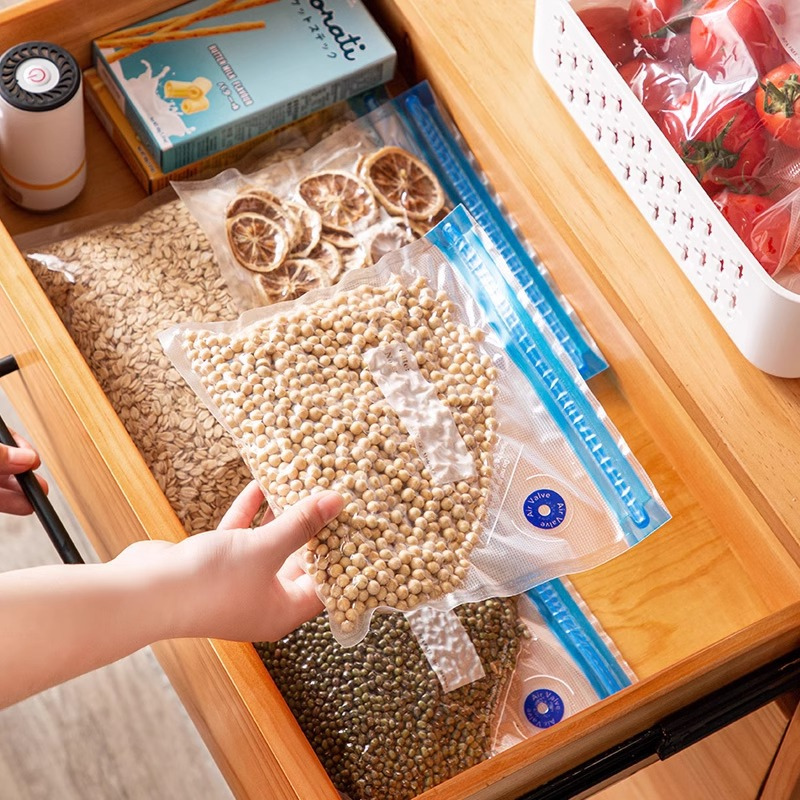 Sellador de Alimentos al Vacío - Rápido, Duradero, Viene con 10 Bolsas Ziplock Reutilizables Gratis